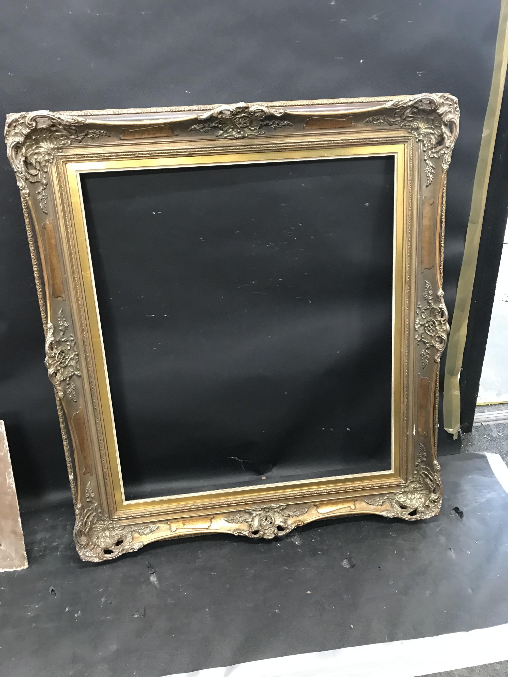 20th Century European School. A Gilt Composition Frame, with Swept and Pierced Centres and - Image 2 of 3