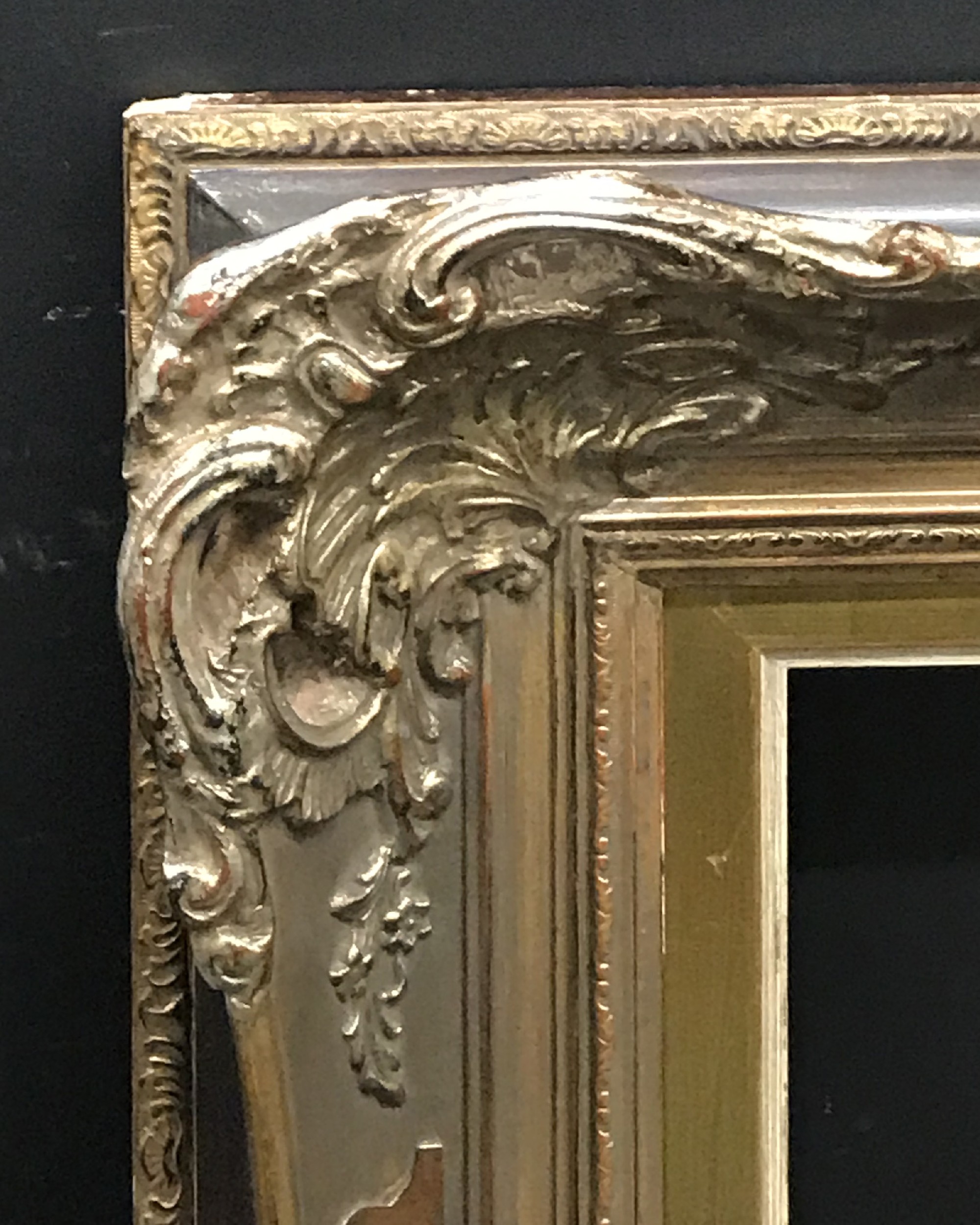 20th Century European School. A Gilt Composition Frame, with Swept and Pierced Centres and