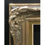 20th Century European School. A Gilt Composition Frame, with Swept and Pierced Centres and