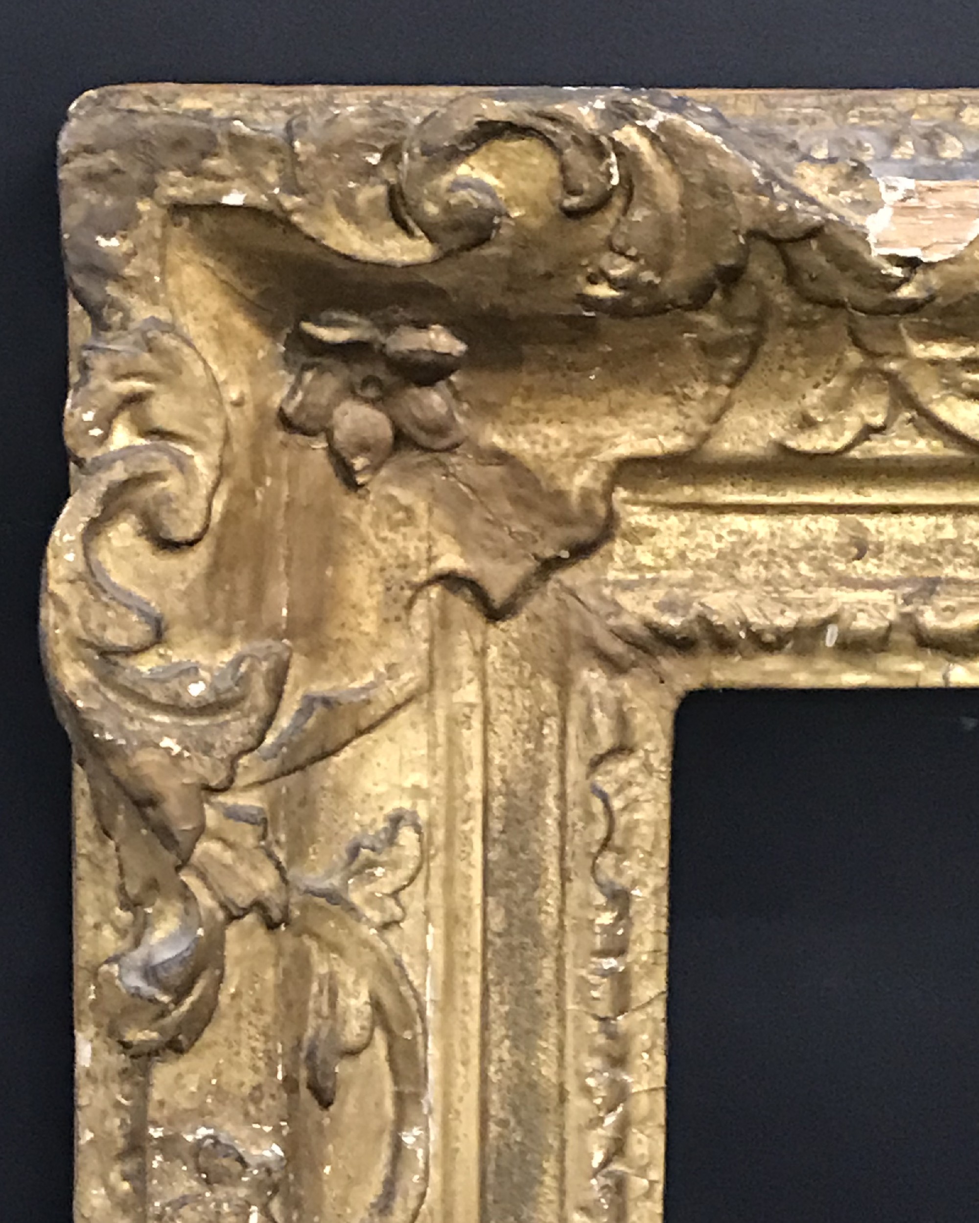 18th Century English School. A Carved Giltwood Frame, with Swept Centres and Corners, 50" x 40", and