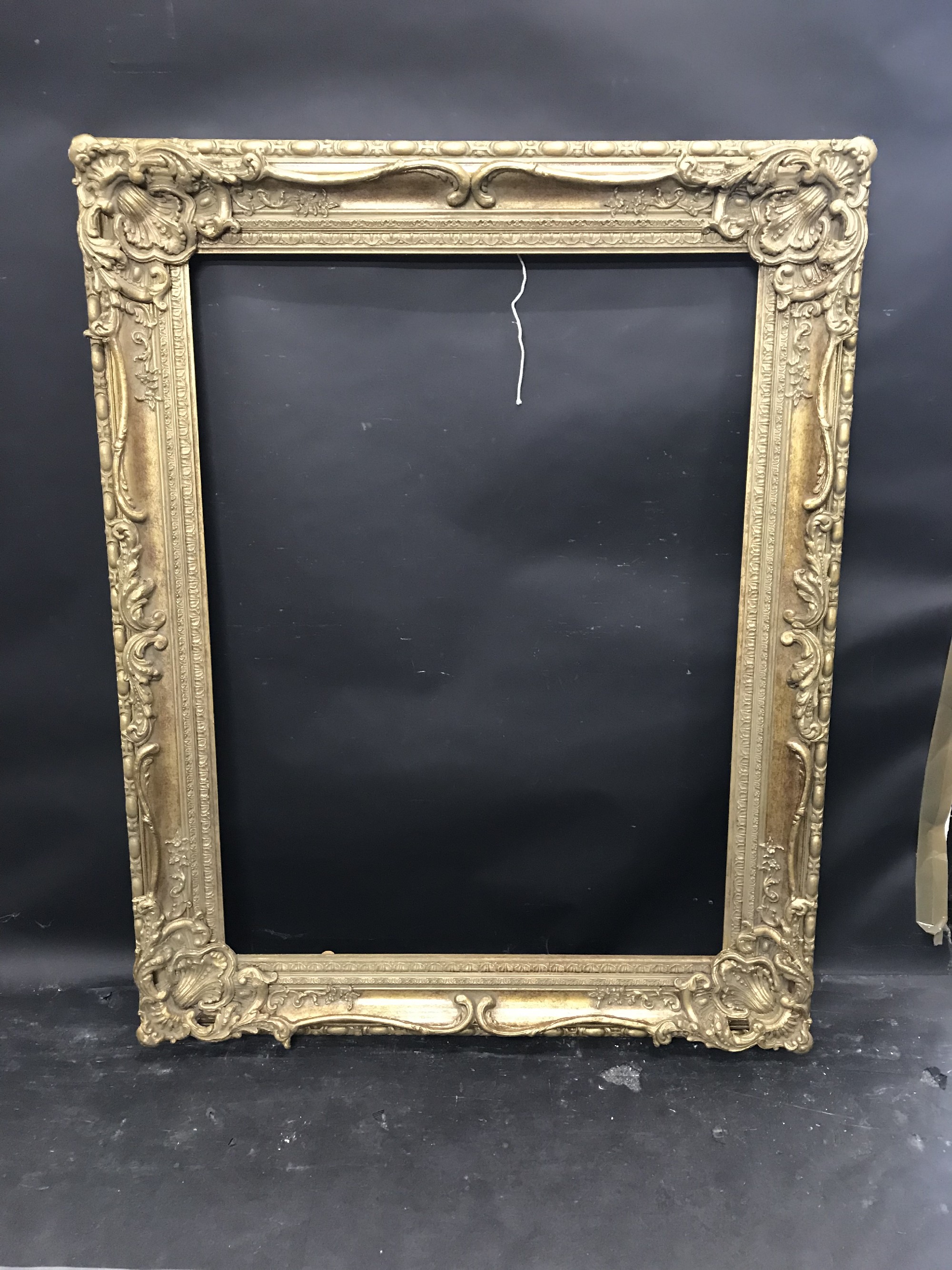 20th Century English School. A Gilt Composition Frame, with Swept Centres and Corners, 40" x 30". - Image 2 of 3