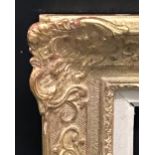 20th Century French School. A Gilt Composition Frame, with Swept Centres and Corners, with Fabric