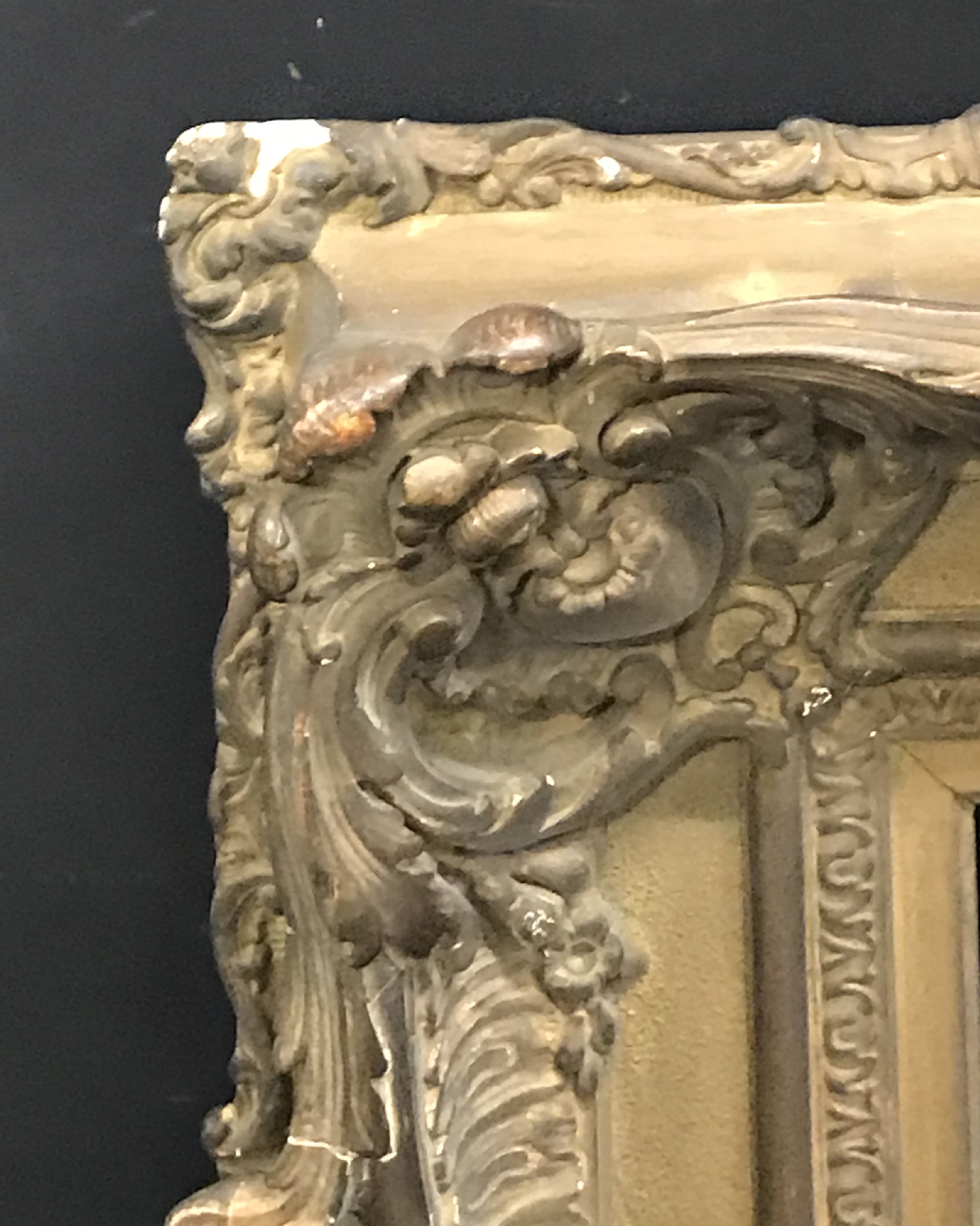 19th Century French School. A Gilt Composition Frame, with Swept and Pierced Centres and Corners,