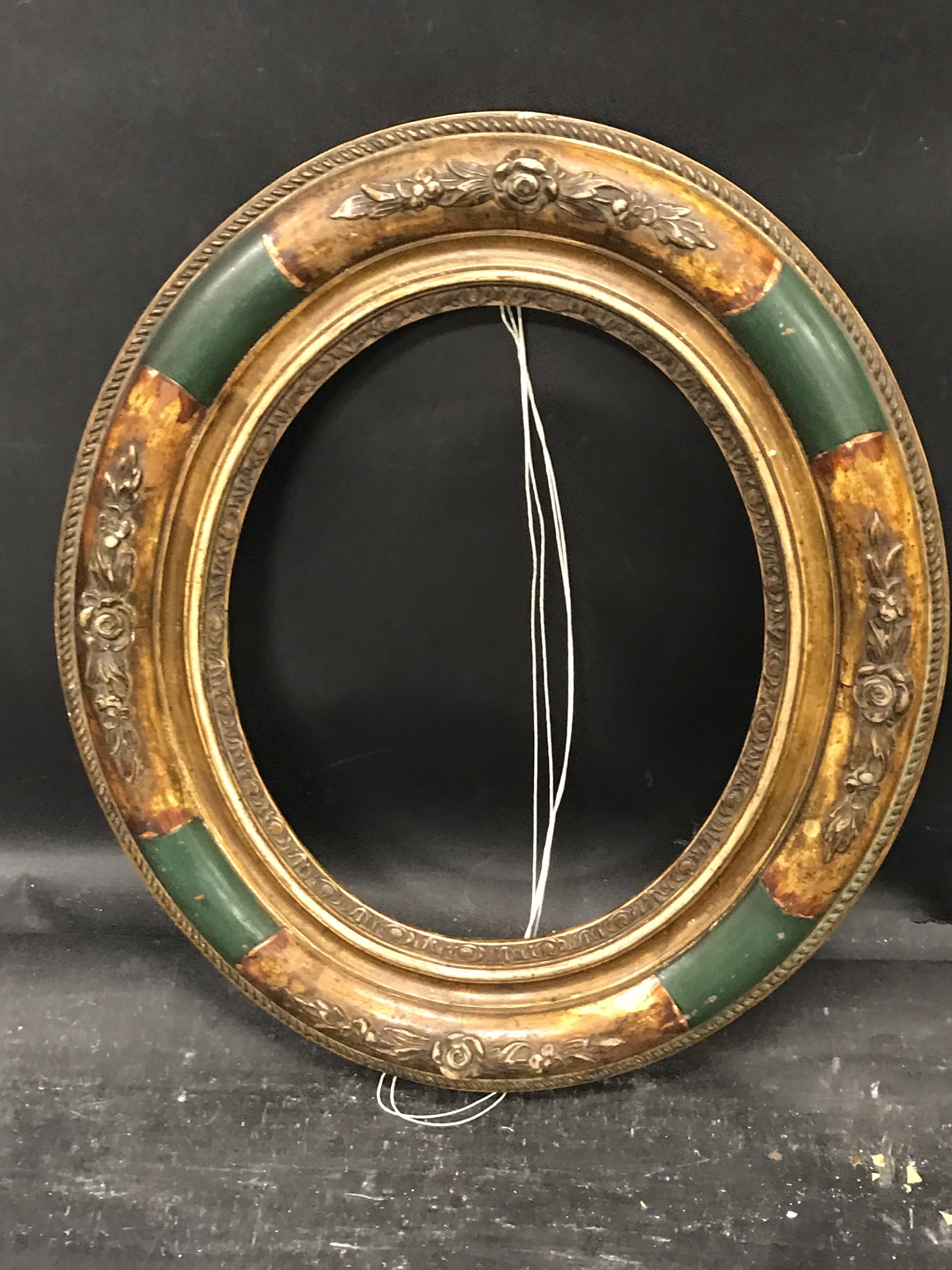 19th Century English School. A Gilt and Green Painted Composition Frame, Oval, 10.5" x 8.5". - Image 2 of 3