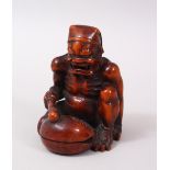 A GOOD JAPANESE MEIJI PERIOD CARVED WOOD OKIMONO GROUP - ONI & DRUM, the carved wood okimono