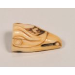 A RARE SUBJECT JAPANESE EDO PERIOD CARVED IVORY NETSUKE OF A SEA EAGLES HEAD, carved from the very