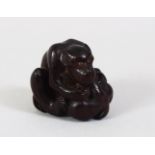 A JAPANESE MEIJI PERIOD CARVED WOODEN NETSUKE OF A MONKEY & YOUNG, the adult seated over its