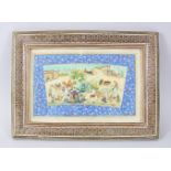 A PERSIAN PAINTING ON IVORY, tents, figures on camels and cows, 10cm x 20cm in a mosaic frame.