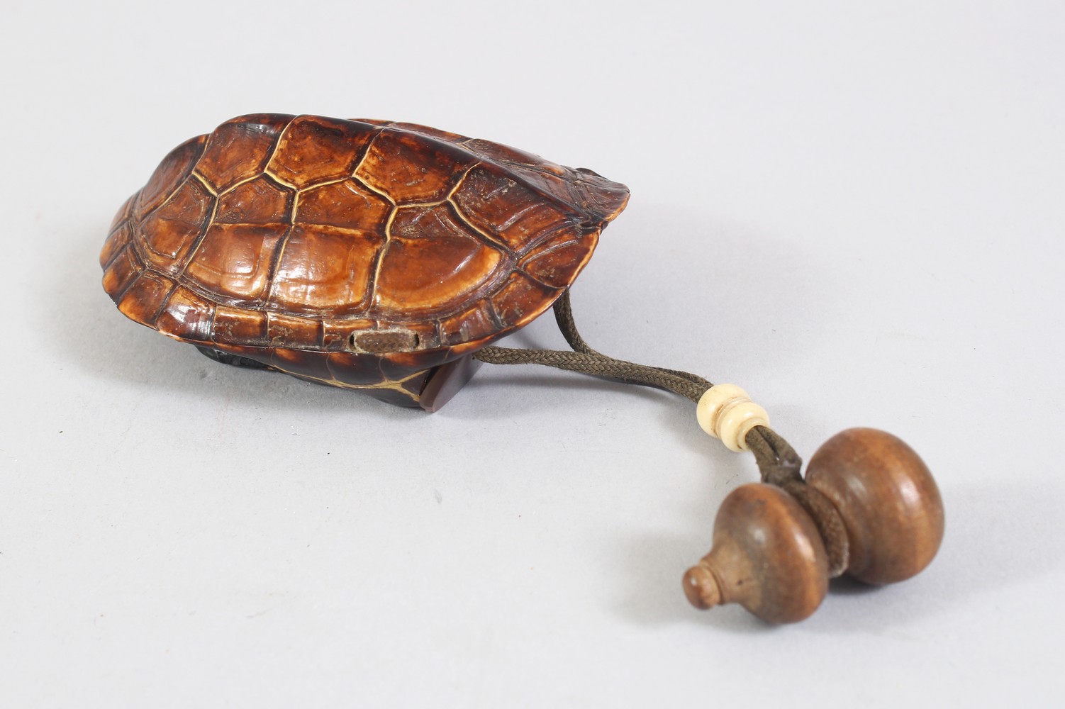 A GOOD JAPANESE MEIJI PERIOD TORTOISESHELL INRO CASE, the inro in the form of a tortoise shell, with