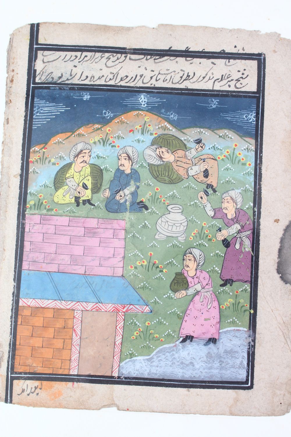 TWO PIECES OF INDAIN SCHOOL ILLUSTRATED MANUSCRIPT, depicting figures drinking in a garden - Image 2 of 3