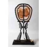 A VERY GOOD CHINESE EBONY, SANDLEWOOD AND IVORY DOUBLE SIDED FAN & STAND, teh fan with pierced,