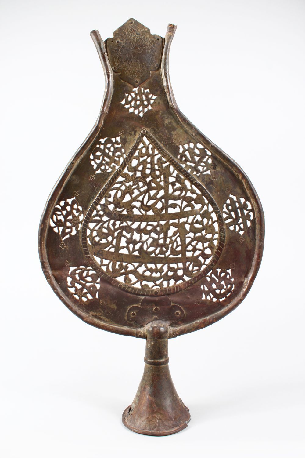 A LARGE 18TH CENTURY INDO PERSIAN COPPER CALLIGRAPHIC STANDARD, with pierced decoration, 52cm high x