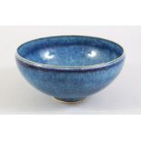A GOOD CHINESE JUN WARE STYLE PORCELAIN BOWL, with a blue graduated peacock glaze, the base with a