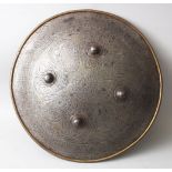 A LARGE ISLAMIC CIRCULAR SHIELD, with gold and inlaid decoration, 48cm diameter.