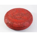 A VERY GOOD 19TH CENTURY CHINESE QING DYNASTY CINNABAR LACQUER CIRCULAR BOX & COVER, the cover