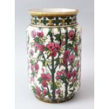 A FISHER POTTERY VASE FOR THE ISLAMIC MARKET, painted with flowers, 23cm high.