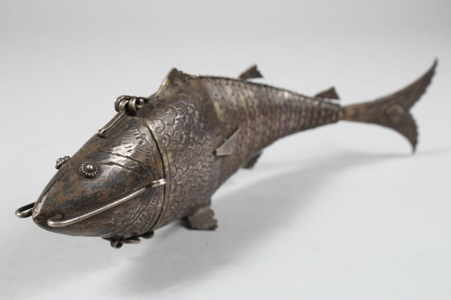 A 19TH CENTURY INDIAN SILVER RETICULATED FISH SHAPED SPICE BOX, the head opening, 25cm long - Image 4 of 6