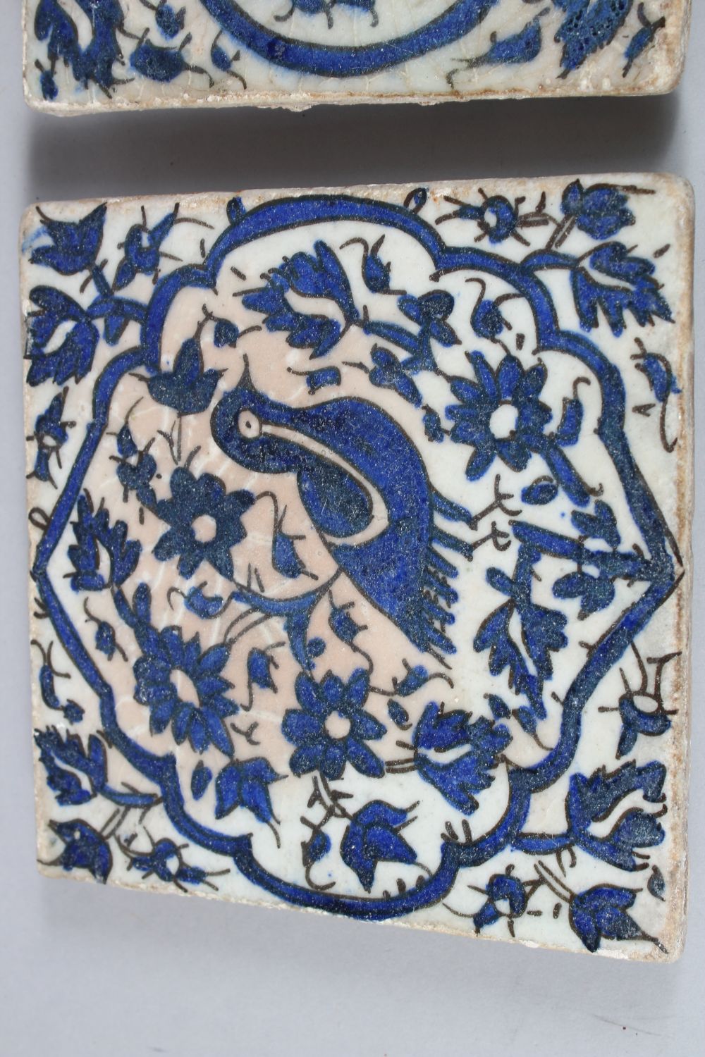 THREE 18TH/19TH CENTURY PERSIAN TILES, each decorated with birds amongst foliage, 15.5cm x 15.5cm - Image 2 of 5