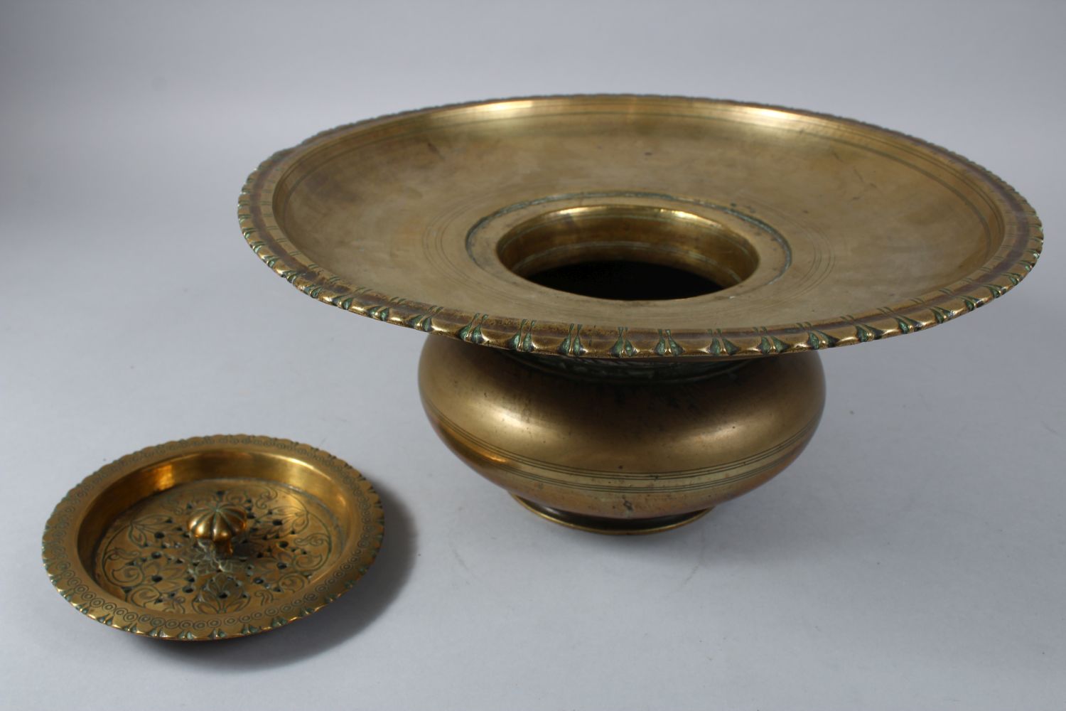 AN 18TH CENTURY MUGHAL INDIAN BRASS EWER & BASIN, the ewer 27cm high x 26cm wide. the basin 15cm - Image 5 of 6