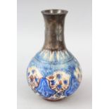 AN EARLY SAFAVID POTTERY BULBOUS VASE, with white metal mounted neck, 18cm high.