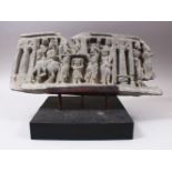 A GOOD EARLY GANDARA CARVED STONE STELE & STAND, carved to depict figures, 42cm x 19cm ( stone alone