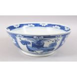 A GOOD 19TH CENTURY CHINESE BLUE & WHITE PORCELAIN PRUNUS BOWL, the exterior with panel decoration
