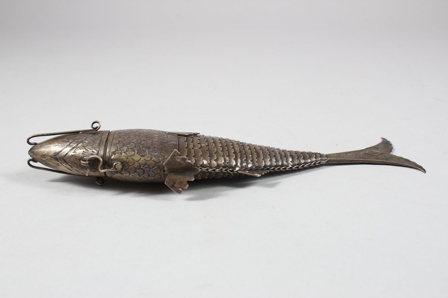 A 19TH CENTURY INDIAN SILVER RETICULATED FISH SHAPED SPICE BOX, the head opening, 25cm long - Image 6 of 6