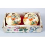 A GOOD PAIR OF EARLY 20TH CENTURY CHINESE PAINTED BALLS, the balls in thier original box, with
