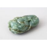 A GOOD CHINESE 19TH / 20TH CENTURY CARVED JADE / JADE LIKE PEBBLE OF DRAGONS, the stone carved to