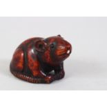 A JAPANESE LATE EDO PERIOD CARVED WOODEN NETSUKE OF A RAT, In the style of Masanao, the rat in a