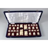 A GOOD 19TH / 20TH CENTURY INDIAN CARVED IVORY CHESS SET IN ORIGINAL BOX, from 10cm high down to 2.