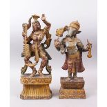 TWO 19TH / 20TH CENTURY INDIAN CARVED WOODEN FIGURES, with poly chrome decoration,, 46cm x 43cm