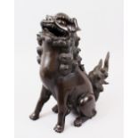 A GOOD 19TH / 20TH CENTURY CHINESE BRONZE FIGURE / CENSER OF A LION DOG / KYLIN, in a seated
