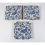 THREE 18TH/19TH CENTURY PERSIAN TILES, each decorated with birds amongst foliage, 15.5cm x 15.5cm