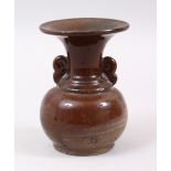 A 19TH CENTURY OR EARLIER CHINESE STONEWARE ZHAODOU SHAPED VASE, with twin moulded handles, the