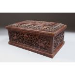 A FINE QUALITY 19TH CENTURY INDIAN MAYSORE CARVED SANDALWOOD LIDDED BOX, the bod carved in deep