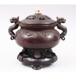 A GOOD CHINESE TRIPLE FOOT BRONZE CENSER & COVER WITH STAND, the bronze censer stood upon three