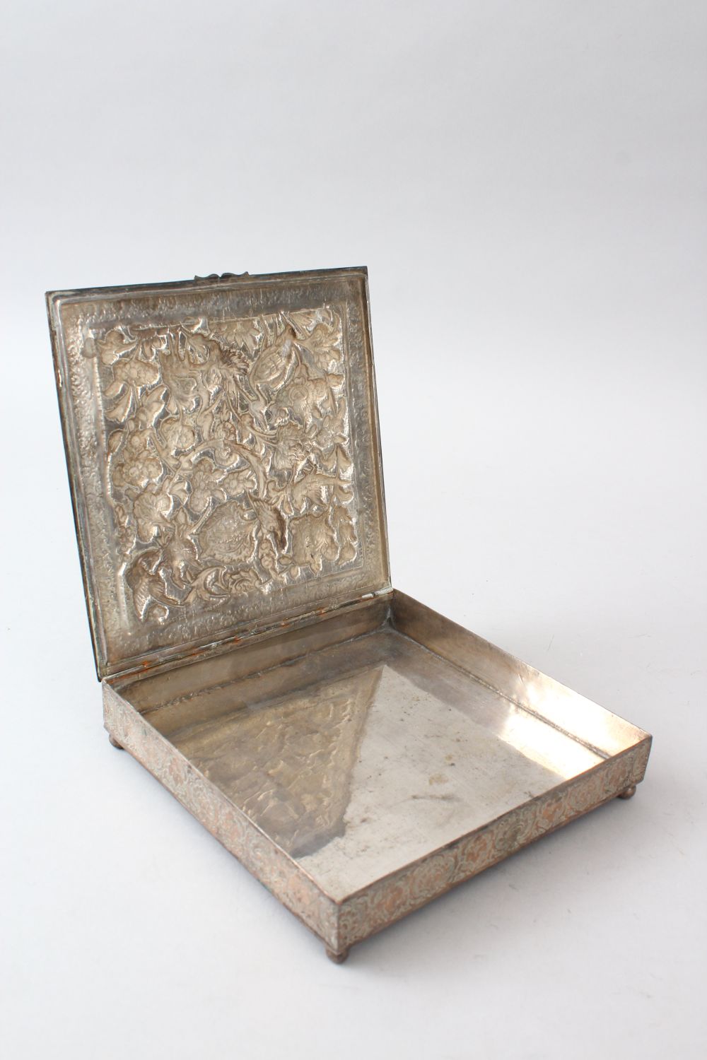 LATE 19TH CENTURY PERSIAN WHITE METAL BOX, the hinged cover embossed with birds and foliage within - Image 3 of 5