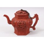 A GOOD 20TH CENTURY CHINESE YIXING CLAY TEAPOT, the body of the pot with carved panels of flora,