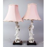 A PAIR OF 20TH CENTURY CHINESE BLANC DE CHINE KANGXI STYLE PORCELAIN FIGURAL LAMPS OF GUANYIN, The