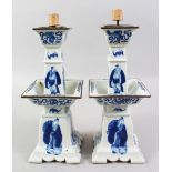 A GOOD PAIR OF 19TH CENTURY CHINESE / INDO CHINESE BLUE & WHITE PORCELAIN ALTER STICKS, the body