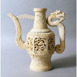 AN EARLY 20TH CENTURY CHINESE CARVED IVORY EWER / TEA POT, the body of the ewer with panels carved