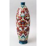 A FRENCH POTTERY VASE, painted for the Islamic market, with rich enamel decoration, 31cm high.
