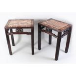 A GOOD PAIR OF 19TH CENTURY CHINESE HARDWOOD AND MOTHER OF PEARL MARBLE TOP STANDS, the tops inset