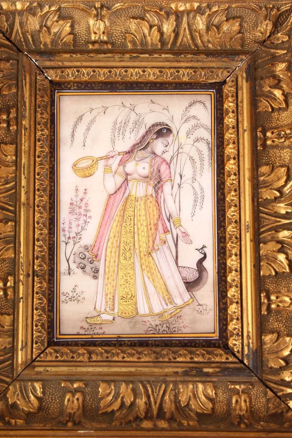 INDIAN SCHOOL, A FEMALE FIGURE HOLDING A MAGICAL INSTRUMENT, A PEACOCK BY HER SIDE, painted on a - Image 3 of 6
