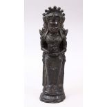 A 19TH / 20TH CENTURY INDIAN BRONZE FUGURE OF A DEITY / BUDDHA, in a standing pose with her hands