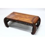 A GOOD 19TH CENTURY CHINESE CARVED HARDWOOD OPIUM TABLE, the table with a solid grooved top, with