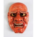 A JAPANESE MEIJI PERIOD CARVED WOOD KAGURA MASK OF AN OLD MAN, eyes with gilding and with traces