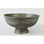 A GOOD EARLY ISLAMIC BRONZE CIRCULAR BOWL, engraved with a band of calligraphy, 25.5cm diameter.