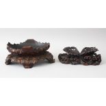 TWO GOOD 18TH CENTURY CHINESE CARVED HARDWOOD STANDS, one carved simulating waves, the other